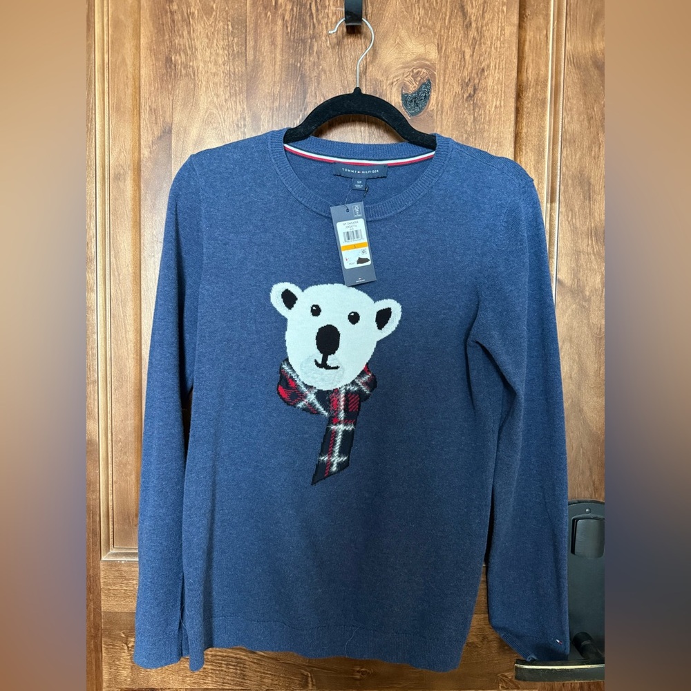 Brand new with tags on.  Tommy Hilfiger sweater size Small.